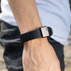 Wearing black cuff as bracelet while the adjustable magnet holds the loose end of Cuff