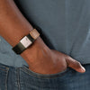 Wearing sage cuff as bracelet while the adjustable magnet holds the loose end of Cuff