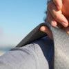 grippy side of the ash slide that prevents slipping in shoulder carry mode