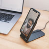 John doing a selfie with his phone while attached to the wireless charging stand