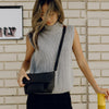 Anne wearing her ash leash as neck carry
