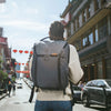 Alvin wearing his charcoal everyday backpack