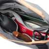 internal zip pocket on the charcoal field pouch