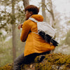 Kara sitting wearing Outdoor Sling