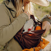 Jessie Opening her Outdoor Sling 