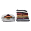 Clothes compressed inside the medium raw packing cube