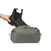 Putting a shoe inside the sage shoe pouch