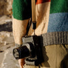 connects coyote leash to the camera using anchor links system