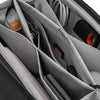 zippered stash pockets for items on black tech pouch