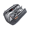 Straps cords accessories and more that could fit inside the charcoal tech pouch